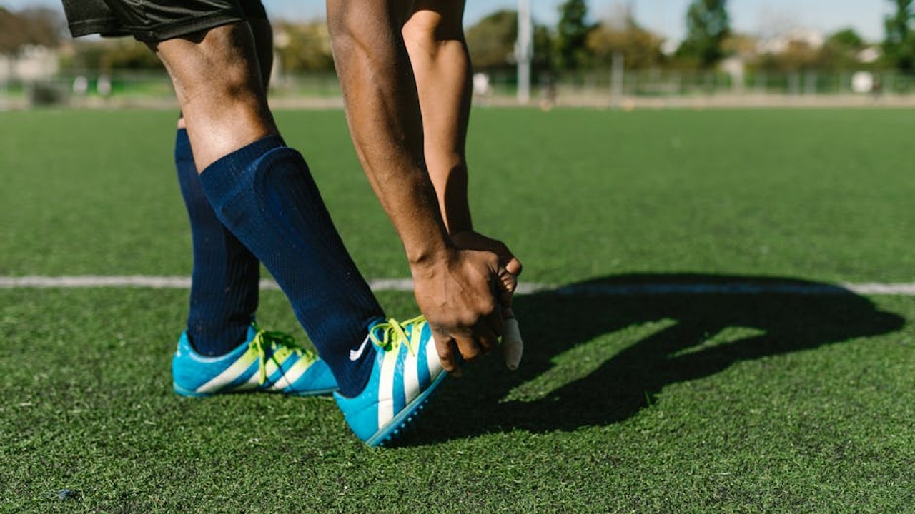 Gamer drinking water and eating a healthy snack to maintain focus