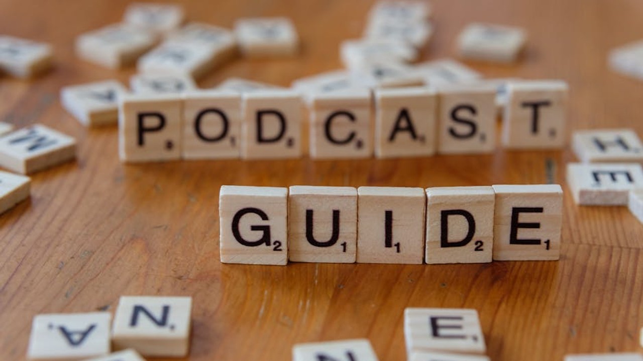 Gaming coach analyzing gameplay VOD with a student on a split screen