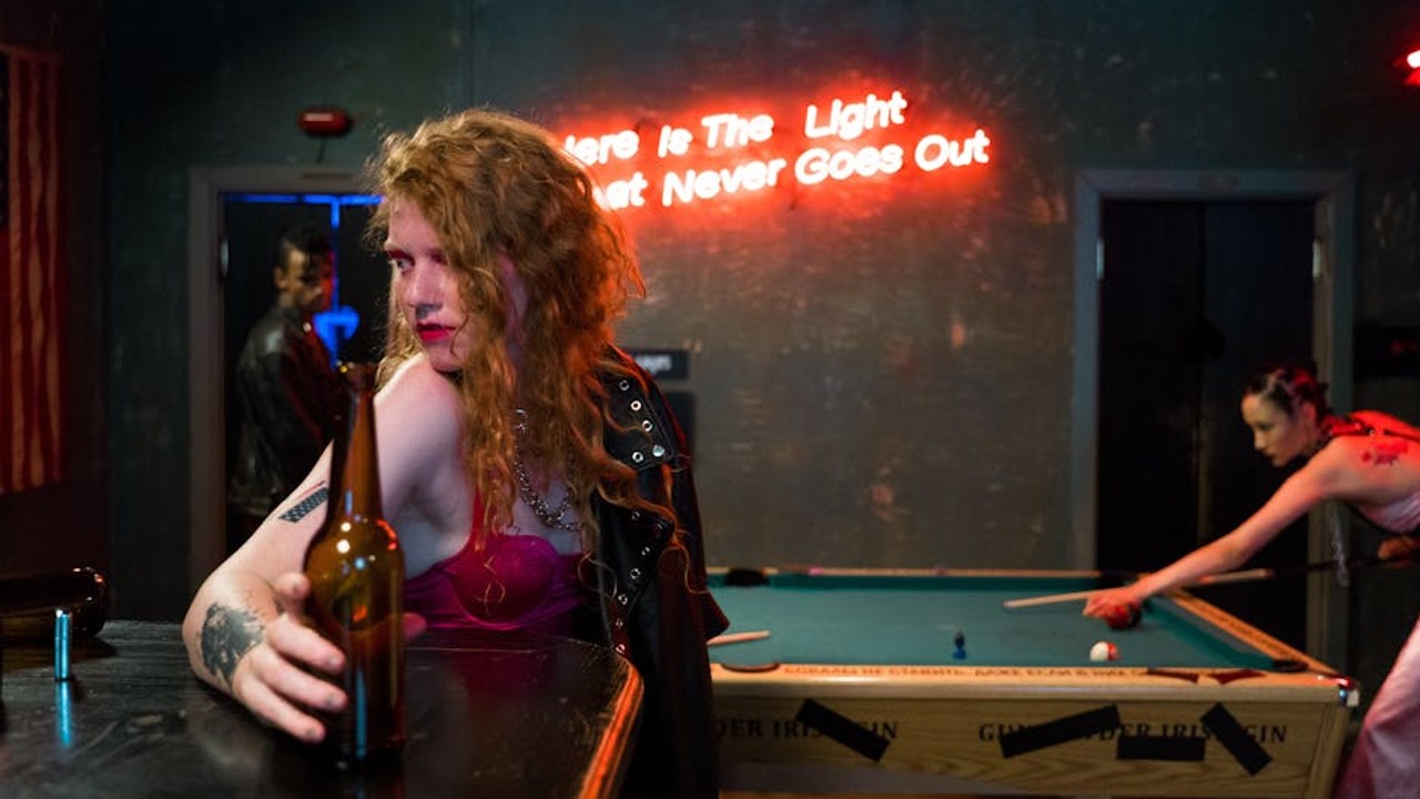 Diverse group of gamers laughing and interacting in a vibrant online gaming community setting